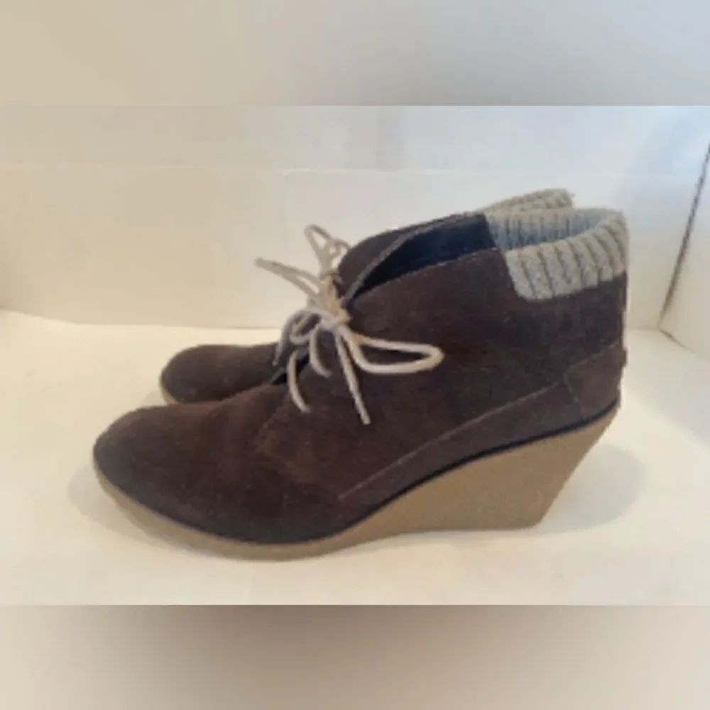 Lacoste suede wedge boot.